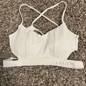 White sports bra, brand new, with pads.